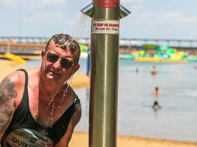 Phillip Roberton cools off at the Darwin Waterfront as hot weather continuesPicture: Glenn Campbell