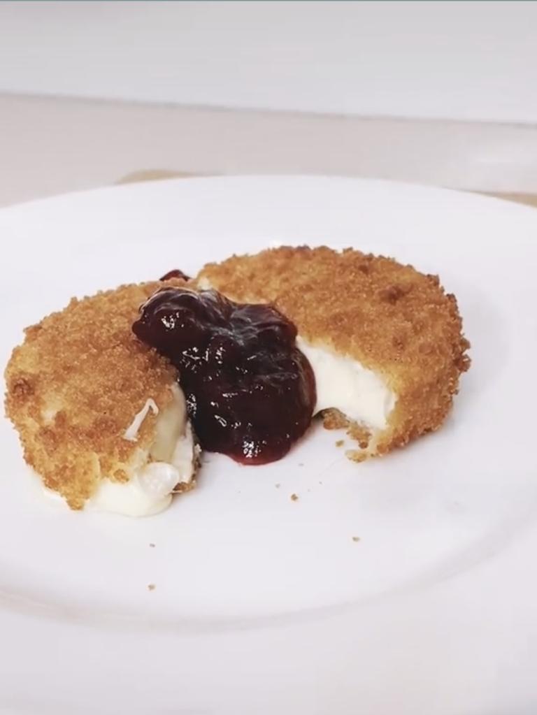 The cheese wheels also come with cranberry sauce. Picture: TikTok/@emilyclairwebster