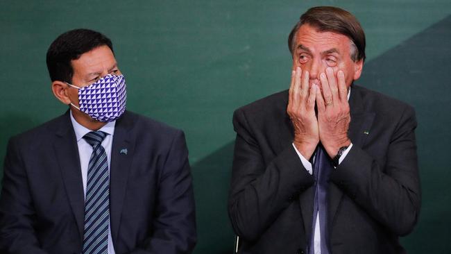 Brazilian Vice-President Hamilton Mourao, left, and President Jair Bolsonaro in Brasilia. Picture: AFP