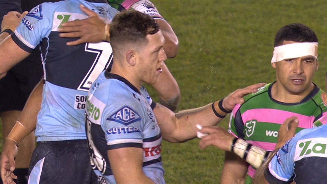 Cody Walker pushed Cameron McInnes away after the Sharks beat the Rabbitohs.