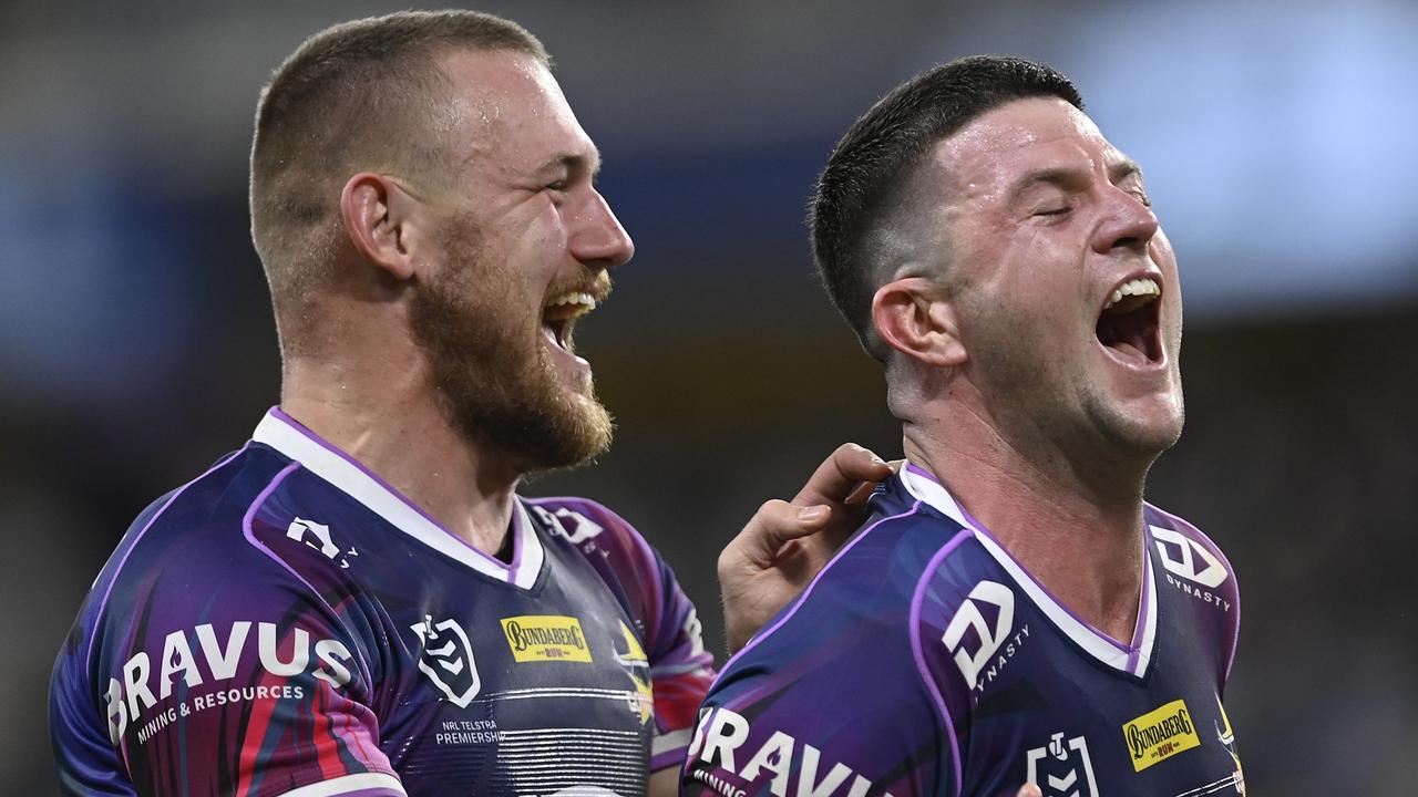 Coen Hess and Chad Townsend are all smiles after the game. Picture: Ian Hitchcock/Getty Images