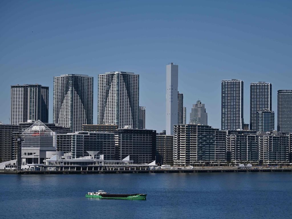 Part of the Olympic village (foreground) is pictured in Tokyo.