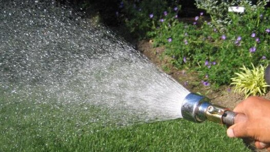 The new level 1 restrictions will mean outdoor watering is permitted before 10am and after 4pm with a trigger nozzle hose. Istock.