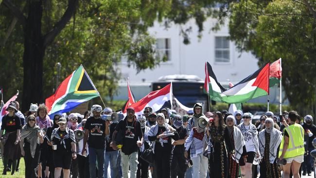 Palestine Action Group supporters march at Parliament House in Canberra on February 7. The activist group A15 Action has urged protesters marching in next week’s demonstrations to show solidarity with each other. Picture: NCA NewsWire / Martin Ollman