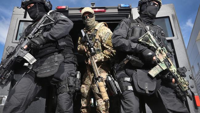 The Queensland Police Service (QPS) and Australian Defence Force (ADF) hold a capability demonstration for the Gold Coast 2018 Commonwealth Games at Broadwater Parklands. SERT squad members at the ready. Picture Glenn Hampson