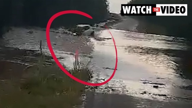 Driver gets washed away on a rural Darwin causeway