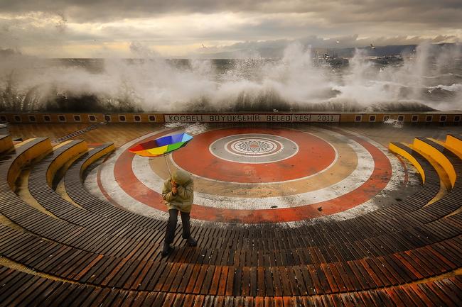 2014 National Geographic Photography Contest ... Honorable Mention Places Photo: “The Storm”. When I was taking a photo with my nephew, the storm came and I caught this beautiful moment. Location: Kocaeli, Turkey. Picture: Aytül AKBAŞ / National Geographic 2014 Photo Contest