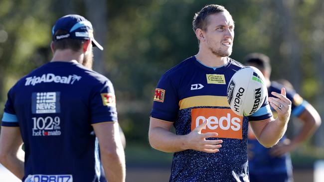 Jack Stockwell (right) at Titans training. Picture: AAP Image/Regi Varghese