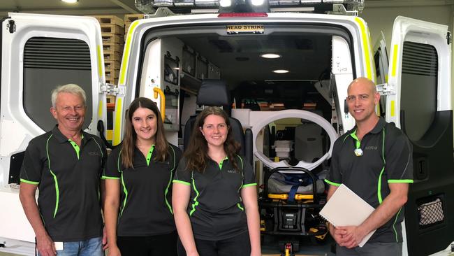 Micro-X managing director Peter Rowland, Flinders Uni 4th Year Biomedical Engineering undergraduates Mia Maric and Erica Nunn and Micro-X engineering manager Anthony Skeats testing out the foam model design of the potential brain stroke scanner inside an ambulance. Picture supplied.