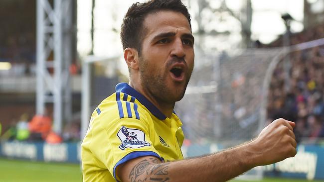 Chelsea’s Cesc Fabregas celebrates scoring his team's second goal during their English Premier League soccer match against Crystal Palace at Selhurst Park, London, Saturday, Oct. 18, 2014. (AP Photo/Tim Ireland)