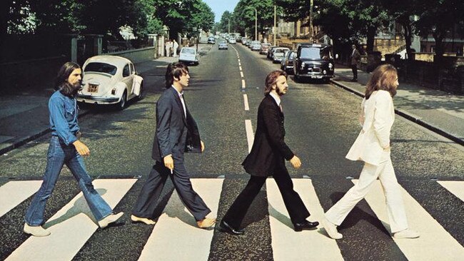 The iconic , Abbey Road album cover photo of John, Paul, George and Ringo on the zebra crossing outside EMI Studios in northwest London.