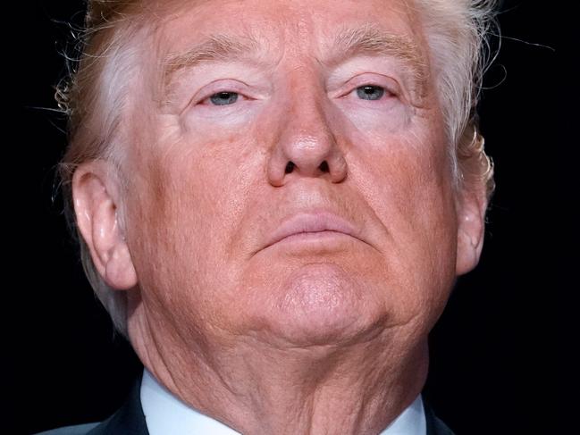 US President Donald Trump attends the National Prayer Breakfast at a hotel in Washington, DC on February 8, 2018. / AFP PHOTO / MANDEL NGAN