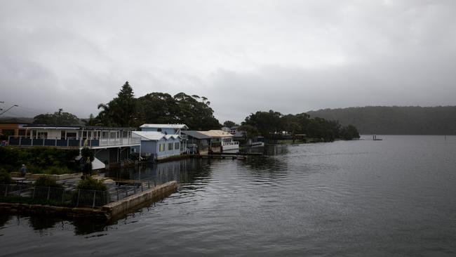 Lakeside houses and piers were partly submerged on March 3 as heavy rains swells lakes and rivers throughout the south coast. PICTURE: Nathan Schmidt