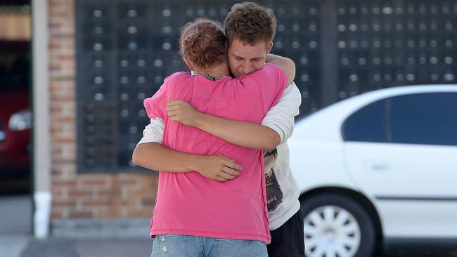 Emotional friends of the victim in Wickham, Newcastle. Picture by Peter Lorimer.