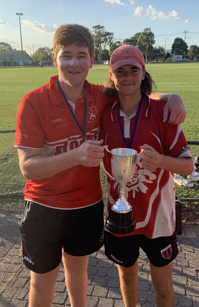 Springy South youngsters Angus Cooper and Mason Keatinge with the Turf 4 premiership cup.