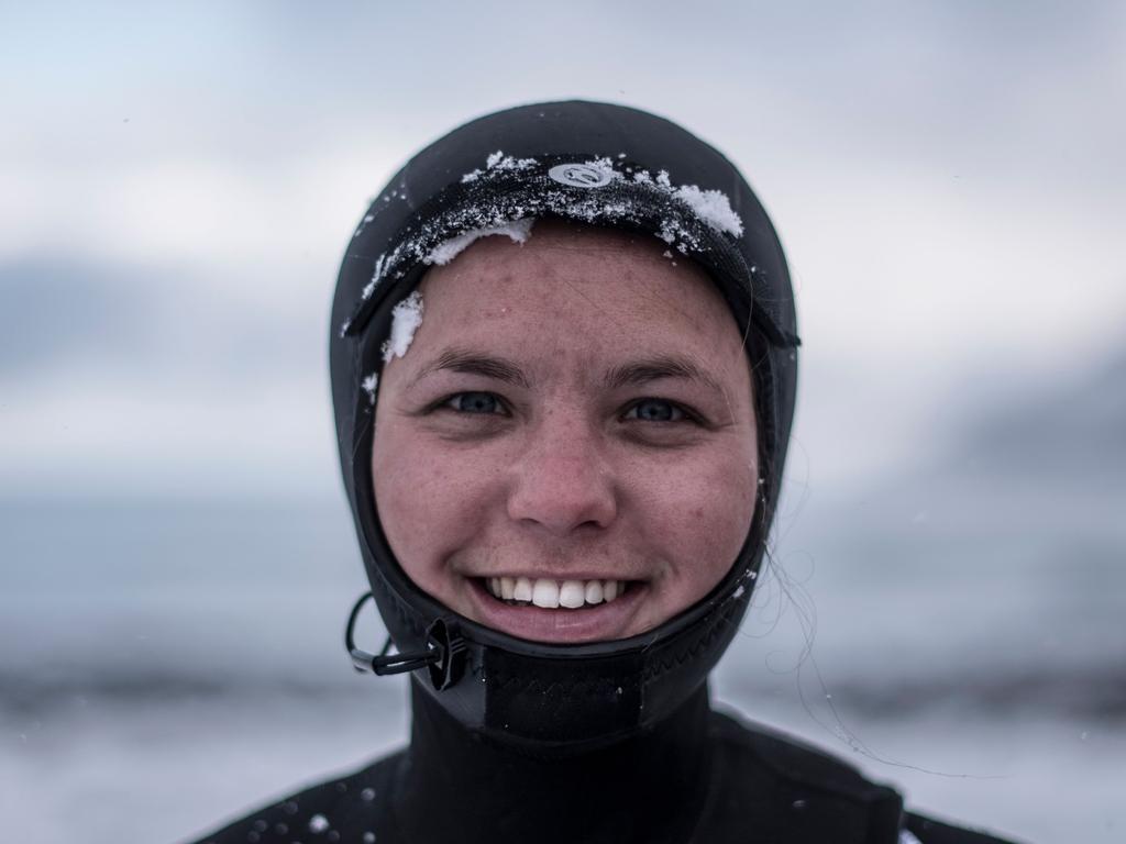 Christina Kolbu from Norway poses after a surf session, on March 11, 2018, in Unstad northern Norway, Lofoten islands, within the Arctic Circle as air temperature drops minus 13°C and water temperature above 4°C. Picture: AFP