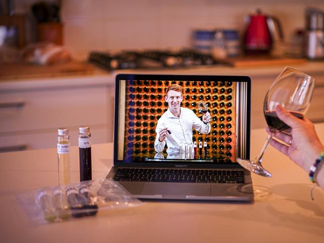 National Wine Centre - Virtual Wine Masterclasses, Head Sommelier James Boden with the ÔNWC at HomeÕ  test tube kit of wines for the class (and a pic of Jamdes on a laptop at home ready to start the class) - Monday April 6, 2020 - pic AAP/MIKE BURTON