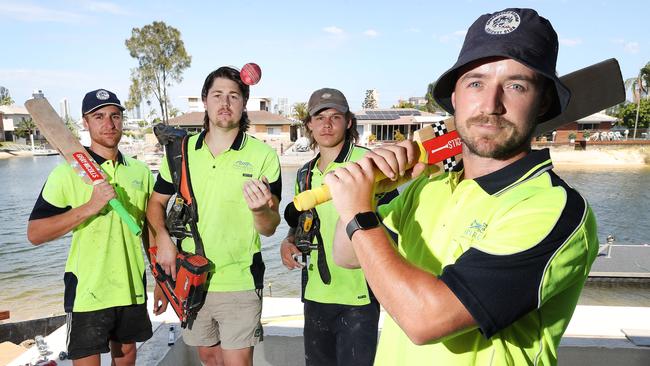 Broadbeach Cricket players Zach Hayes,Cam Gallagher, Connor Rowley and Captain Trent Keep at work with their cricket gear to promote the club's mental health program that has begun since the death of Gold Coast cricket member Trent Walters by suicide. The blokes are tradies by day and also cricketers hoping to normalise chatting about men's mental health. Picture Glenn Hampson