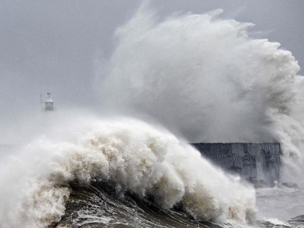 Waves crash over Newhaven Lighthouse in southern England, as strong winds and heavy rain from Storm Ciaran batter Britain. Picture: Glyn Kirk/AFP