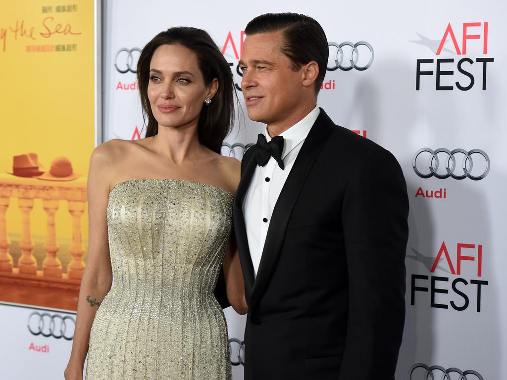 Angelina Jolie & Brad Pitt loved up on the red carpet