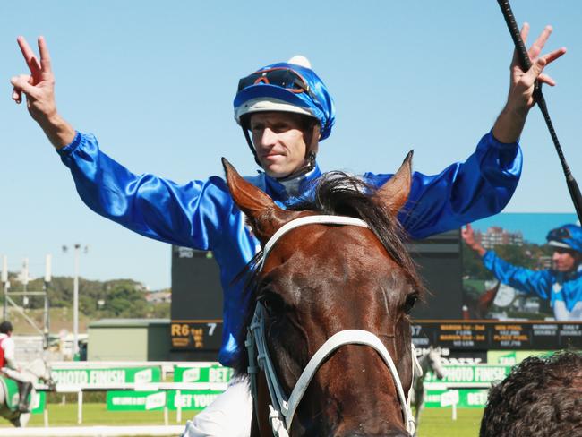 Hugh Bowman returns to scale on Winx after her amazing first-up win. Picture: Getty Images