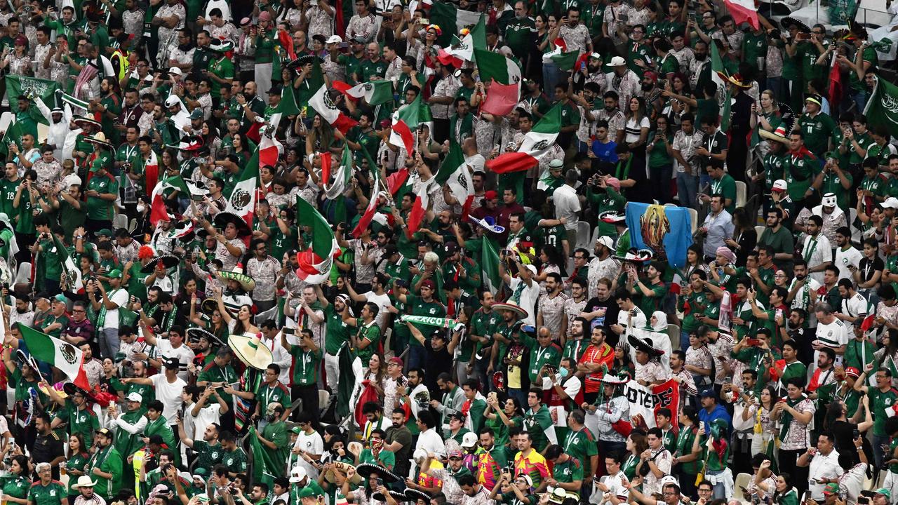 Fans of Mexico. Photo by Pablo PORCIUNCULA / AFP.