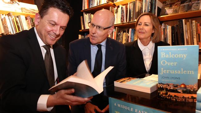 Senator Nick Xenophon, left, with John Lyons and his wife Sylvie Le Clezio. Picture: James Croucher