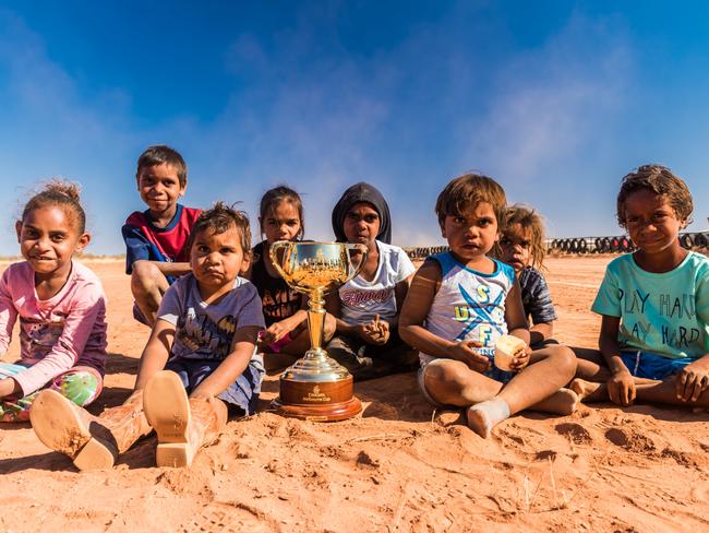 Children with the Cup at the Santa Teresa Racetrack, 80km southeast of Alice Springs.