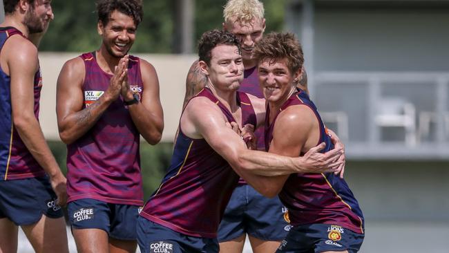 Lachie Neale and Zac Bailey compete for the ball during a pre-season drill.