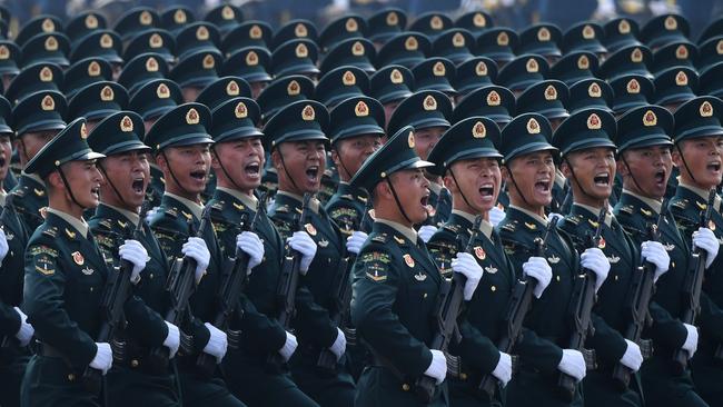 Chinese troops march during a military parade in Tiananmen Square in Beijing on October 1.