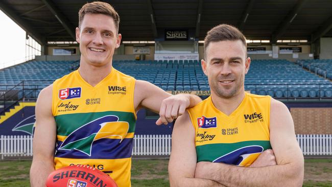 Former Woodville-West Torrens players Luke Thompson and Matthew Goldsworthy at Woodville Oval. Picture: Ben Clark