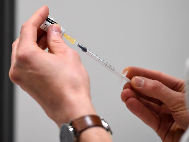 A health worker prepares a dose of the Pfizer-BioNTech COVID-19 vaccine in Nancy, eastern France, on Wednesday. Picture: AFP