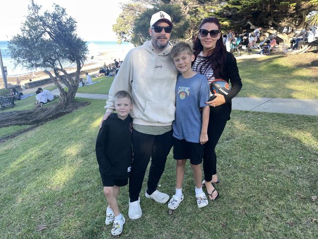 Jason Mann, Colton, Xavier and Tegan Mann at Cowes Foreshore on Phillip Island for the 2024 New Year's Eve fireworks. Picture: Jack Colantuono