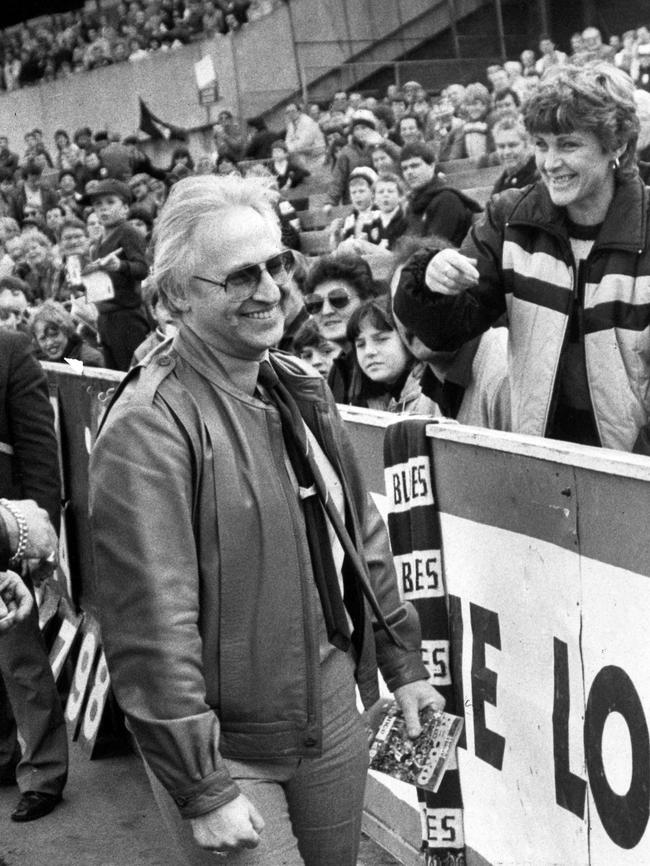 Edelsten shares a joke with supporters at his first match as owner.