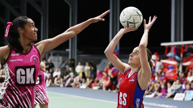 Leps' Ciarn MacBride defends against Sharks' Angelina Kick-Peters in the Cairns Netball Division 1 grand final match between the WGC Sharks and the Cairns Leprechauns. Picture: Brendan Radke