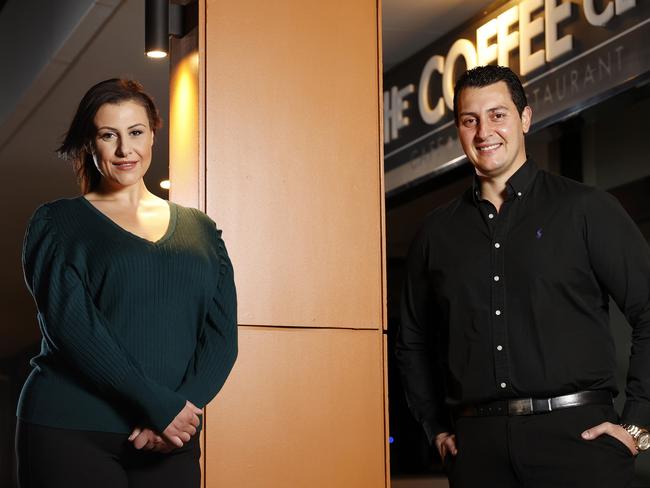 Paul Salamakis with his sister Tina at the Coffee Club in western Sydney which they own and operate. Picture: Jonathan Ng