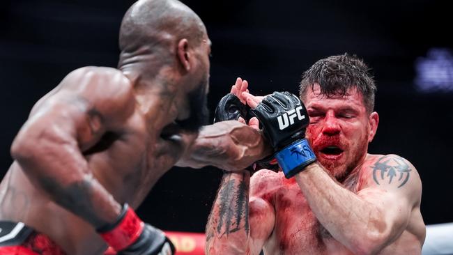 Bobby Green and Jim Miller exchange strikes. (Photo by Carmen Mandato/Getty Images)