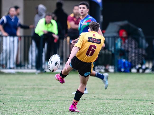 LukePickett puts up a bomb in first grade after an outstanding game for Riverstone U19s. Picture Warren Gannon Photography