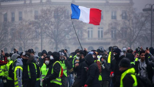 Demonstrators gather near the Arc de Triomphe. Picture: AFP