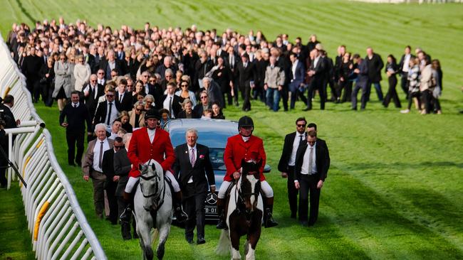 Hundreds of mourners joined the guard of honour.