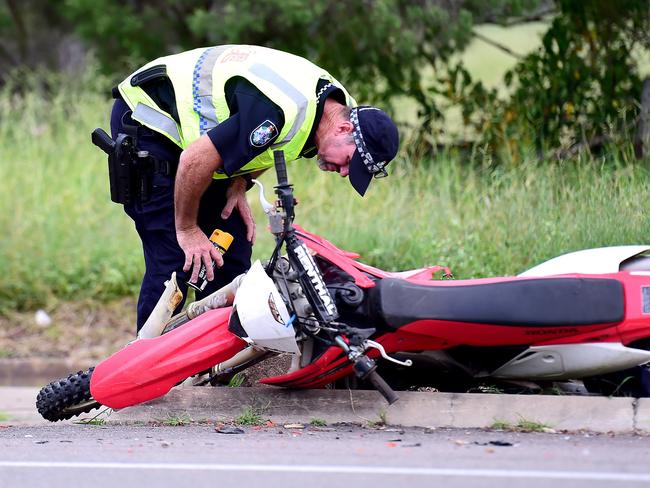 Emergency Services respond to a crash between a Motorcycle and a Ute on Geaney Lane, Deeragun. Picture: Alix Sweeney