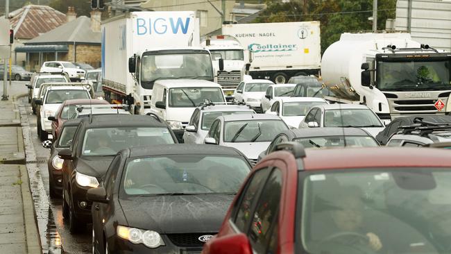 Traffic backed up along Marsh St, Arncliffe at the intersection with the M5. Picture: John Appleyard