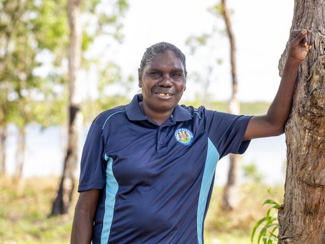 Gapuwiyak woman Margaret Marrkula says she will miss the ADF soldiers being in the community because they became her friends. She stands in front of Lake Evella. Picture: Floss Adams.