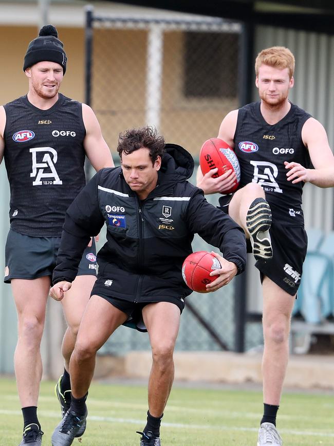 Drew (right) at training with Tom Clurey and Steven Motlop. Picture: Sarah Reed.