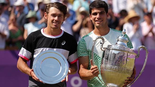 Runner-up Alex De Minaur and winner Carlos Alcaraz pose with their trophies. Picture: Getty Images