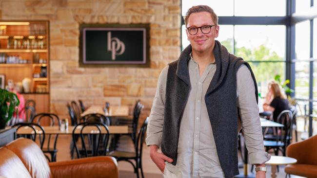 The Blonde Butler, aka Alex Cadger, at his newly-opened first restaurant, "The Butler's Pantry." Il. Picture: Justin Lloyd.