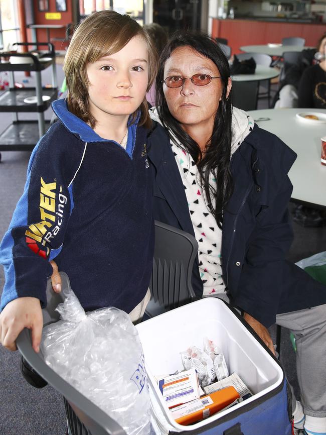 Emblematic of Port Lincoln’s plight, Wendy Sky with her son Shilo, 7, whose medication has to be cooled in an Esky. Picture Sarah Reed. Picture Sarah Reed.