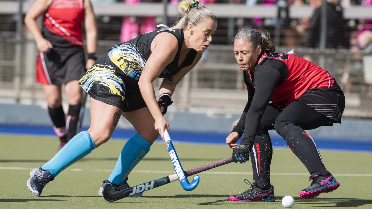 Renee Dunstan (left) of Gold Coast 1 against Jacquleen Prinsloo of Rockhampton 1.