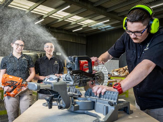 Students Amelia, Matthew and Angus make the most of the school’s wood working facilities. Picture: Jake Nowakowski