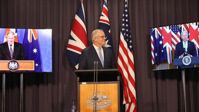 ‘Such achievements come at a cost’ … ScoMo announces the AUKUS security partnership officially on a three-way vall with PM Johnson and President Biden.